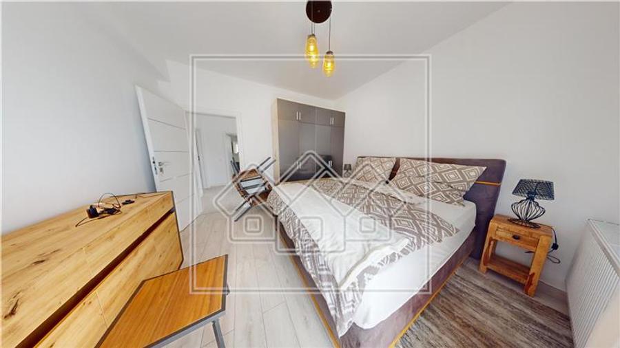 Casă individuală cu 5 camere cu Teren 458 Mp în Cisnădioara