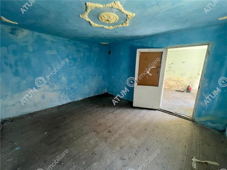 Casă individuală cu 5 camere cu Teren 489 Mp în Central