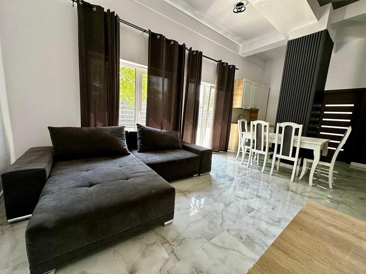 Apartament cu 3 camere semidecomandat, mobilat în Dâmbul Rotund