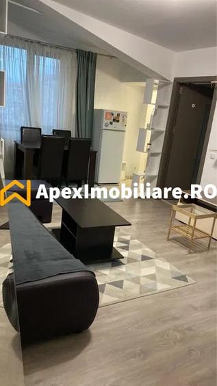 Apartament cu 3 camere semidecomandat, mobilat în 1 Mai