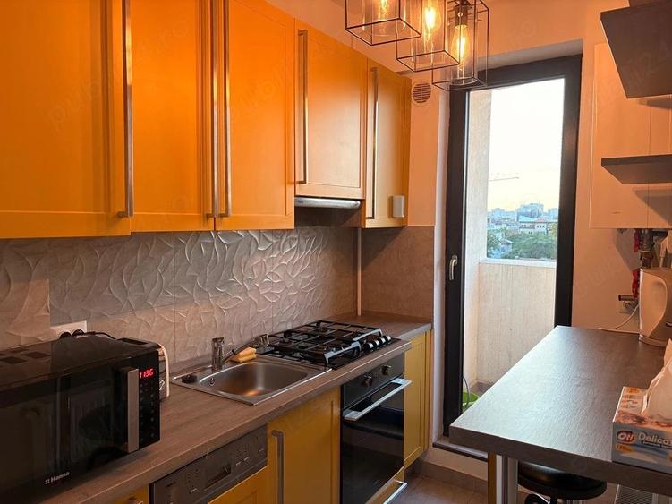Apartament cu 2 camere semidecomandat, mobilat în Central