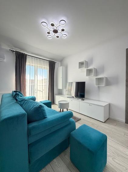 Apartament cu 2 camere semidecomandat, mobilat în Florești