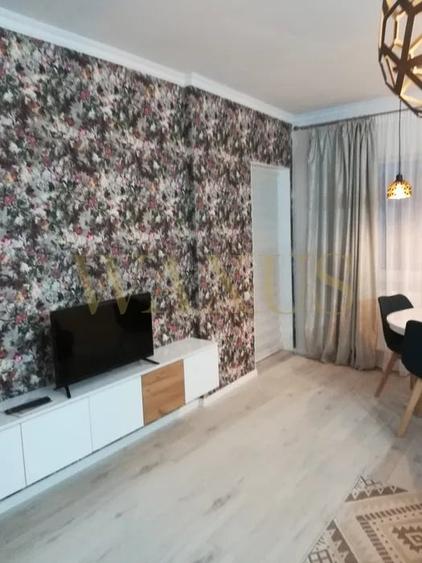 Apartament cu 2 camere semidecomandat, mobilat în Florești — fotografia 3