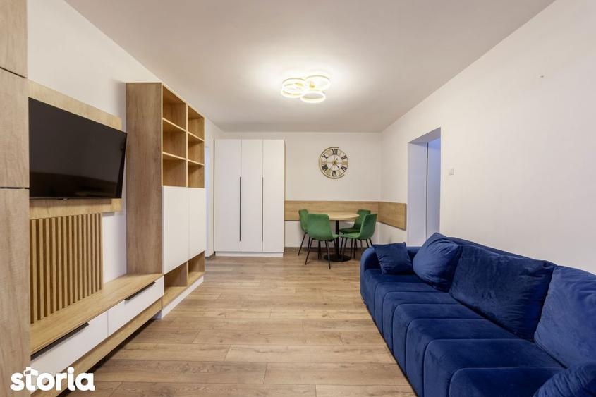 Apartament cu 3 camere semidecomandat, mobilat în Calea București