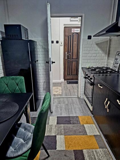 Apartament cu 2 camere semidecomandat în Podu Roș