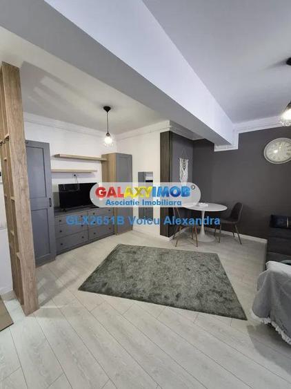Apartament cu 2 camere semidecomandat, mobilat în Berceni
