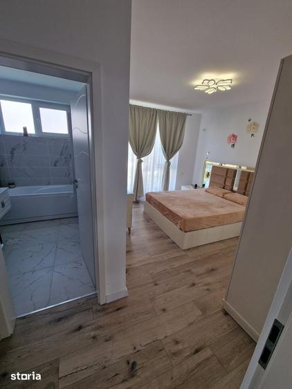 Casă cu 4 camere cu Teren 80 Mp în Titan