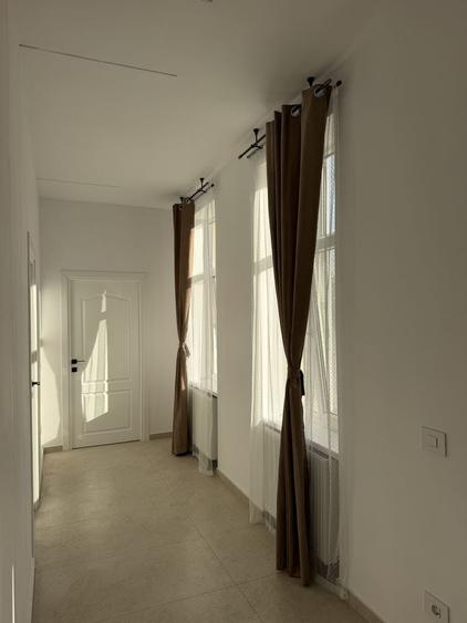 Apartament cu 3 camere decomandat în Romană