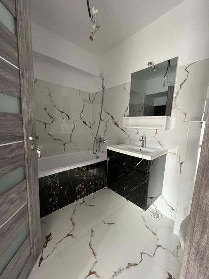 Apartament cu 2 camere decomandat în Casa de Cultură