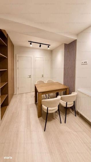 Apartament cu 3 camere decomandat în Tractorul