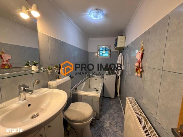 Casă cu 4 camere decomandat în Mărăcineni