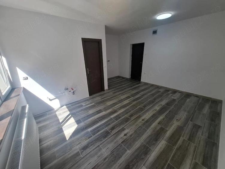 Str. Minerilor garsoniera situata la etajul 1, finisata, pretabila pentru locuinta sau cabinet. - 4