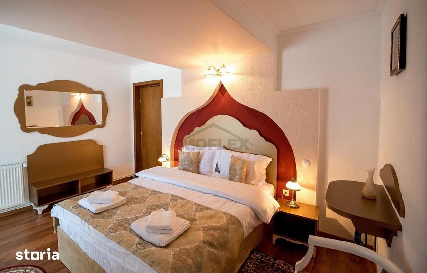 Casă cu 9 camere cu Teren 1004 Mp în Central