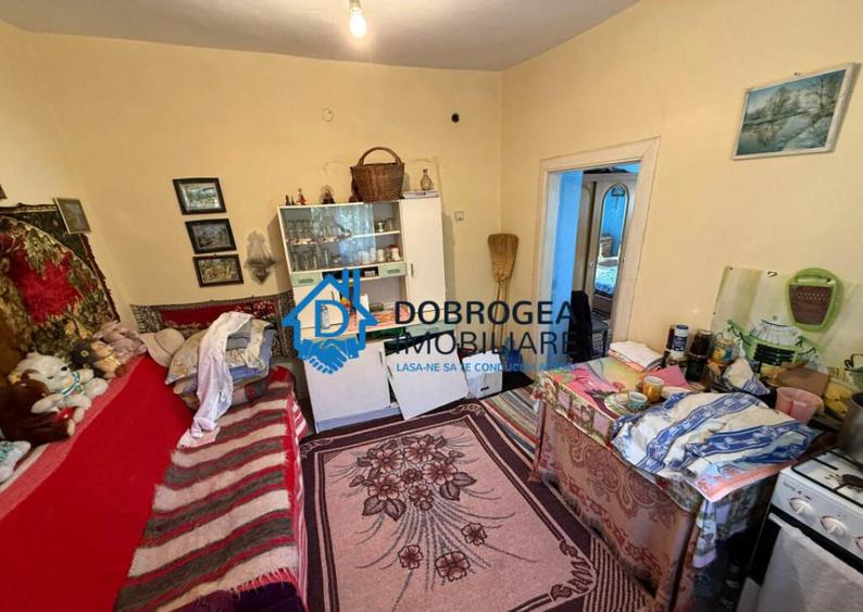 Caslita - teren 513 mp, pomi fructiferi, casa 2 camere - 12