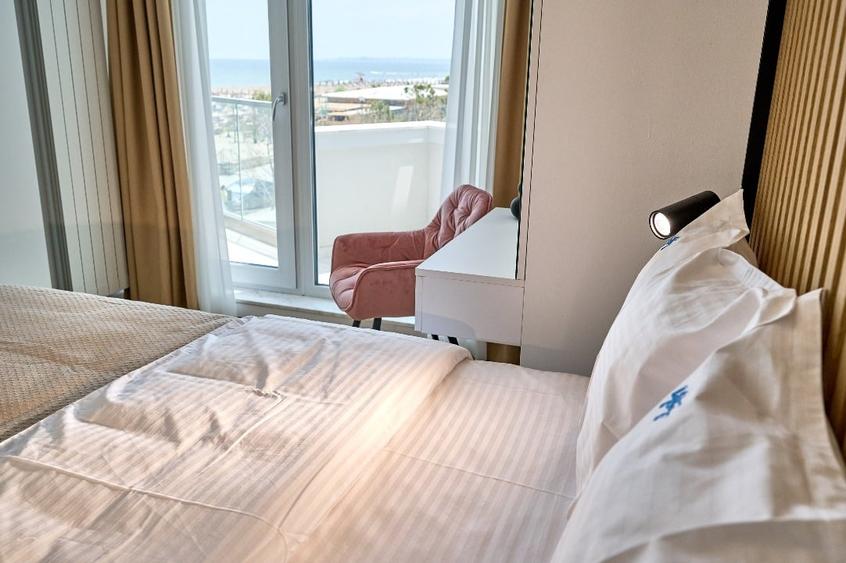 Ofer pentru inchiriere apartament 3 camere cu vedere frontala la mare - 9