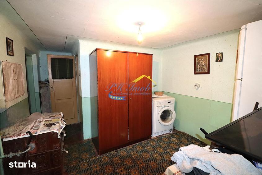 Casă cu 5 camere cu Teren 1014 Mp în Bănești