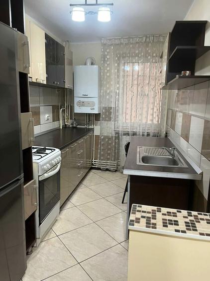 Garsoniera moderna, in centrul Craiovei complet mobilata si utilata - 4