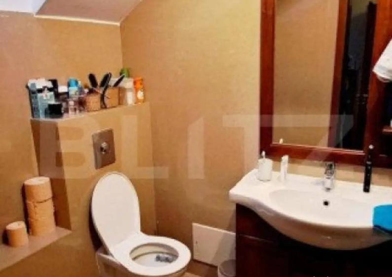 Casa individuala cu 4 camere,200 mp, teren 365 mp,cartier E - 1