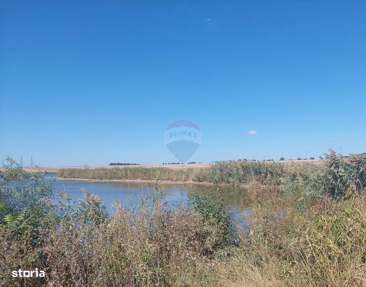 Oportunitate dezvoltare: 10.032 mp cu front la lac, lotizat - 1