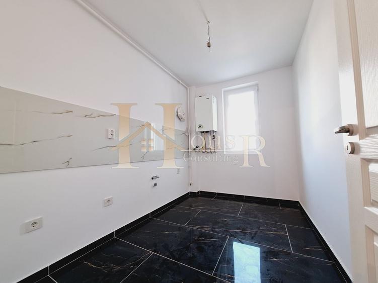 Etajul 1. Bucatarie inchisa. 35 mp utili. Decomandat. - 4