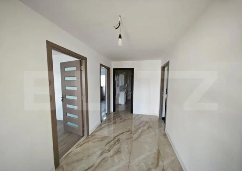 Casa cu 4 camere, 105 mp utili, cu garaj si 500 mp teren, zo - 2