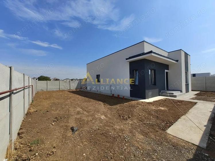 Casa individuala - 82 mp utili + terasa 13 mp - Teren- 380 mp - 11