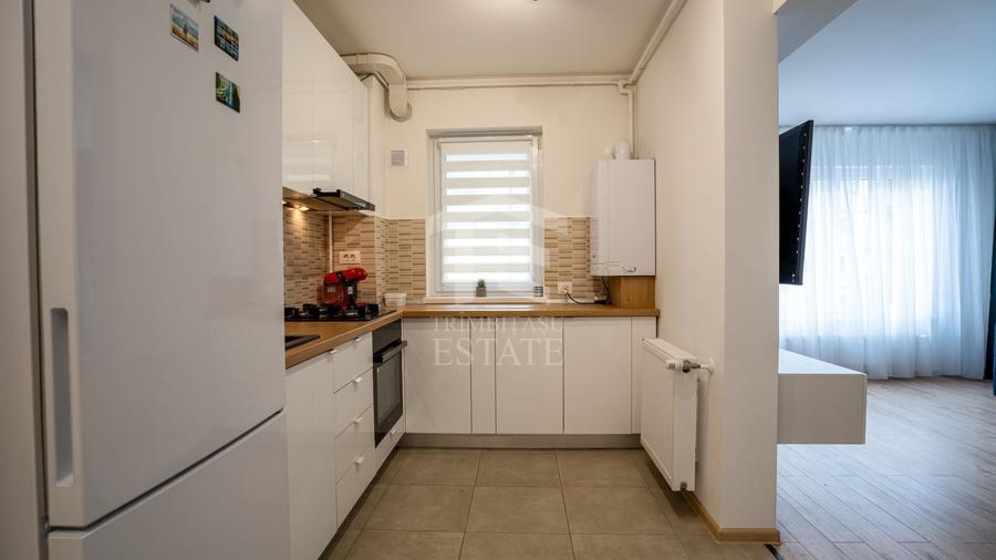 Apartament cu 2 camere semidecomandat, mobilat în Tractorul