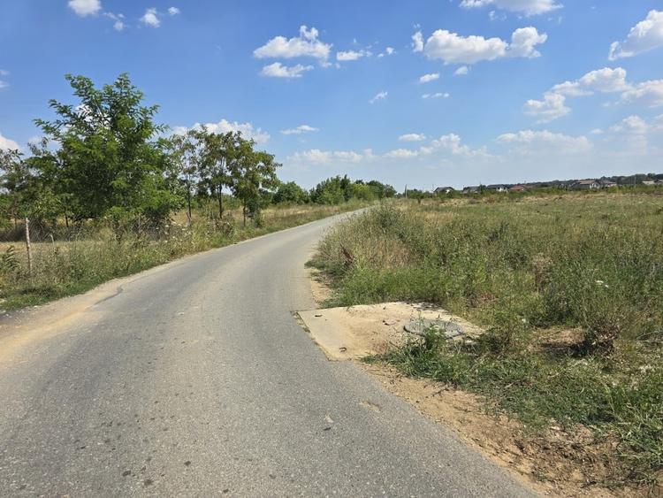 Teren intravilan 6525mp, plata in rate, 9 loturi, asfalt - 6