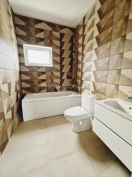 Casa noua, intabulata, in Harman.