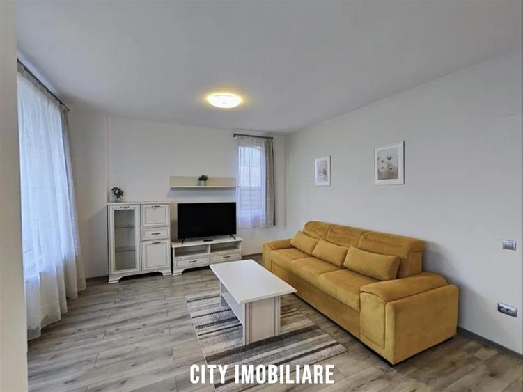 Apartament cu 2 camere semidecomandat, mobilat în Borhanci