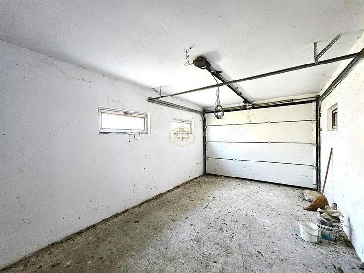 Casa spatioasa cu 4 dormitoare + garaj si anexe | Teren 1.000 mp