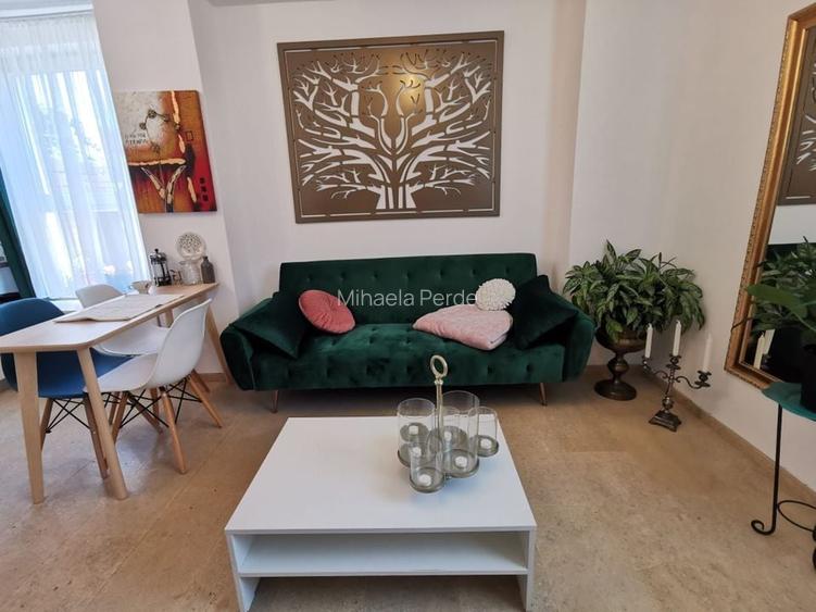 Apartament cu doua camere si loc de parcare