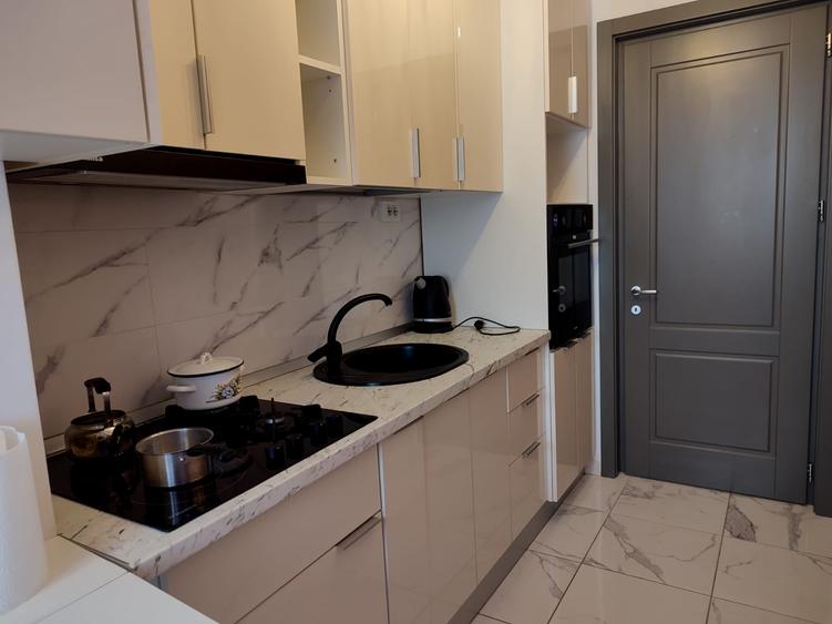 Apartament cu 2 camere semidecomandat, mobilat în Central