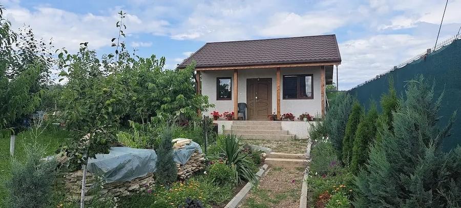Casă cu Teren 1030 Mp în Ogrăzile