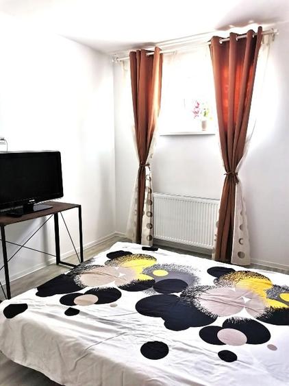 Apartament cu 2 camere semidecomandat, mobilat în Central