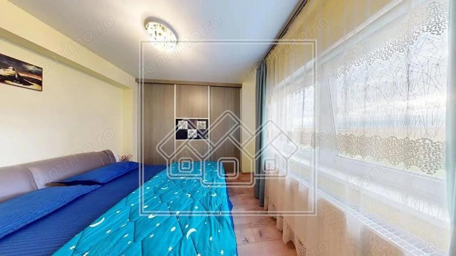 Ap.cu 3 camere, 2 bai si balcon, etaj intermediar, mobilat si utilat - 12