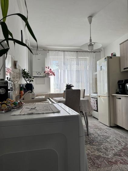 Apartamant cu 3 camere, 2 bai + garaj - 1