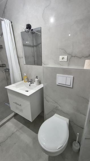 Garsonieră decomandată în Central