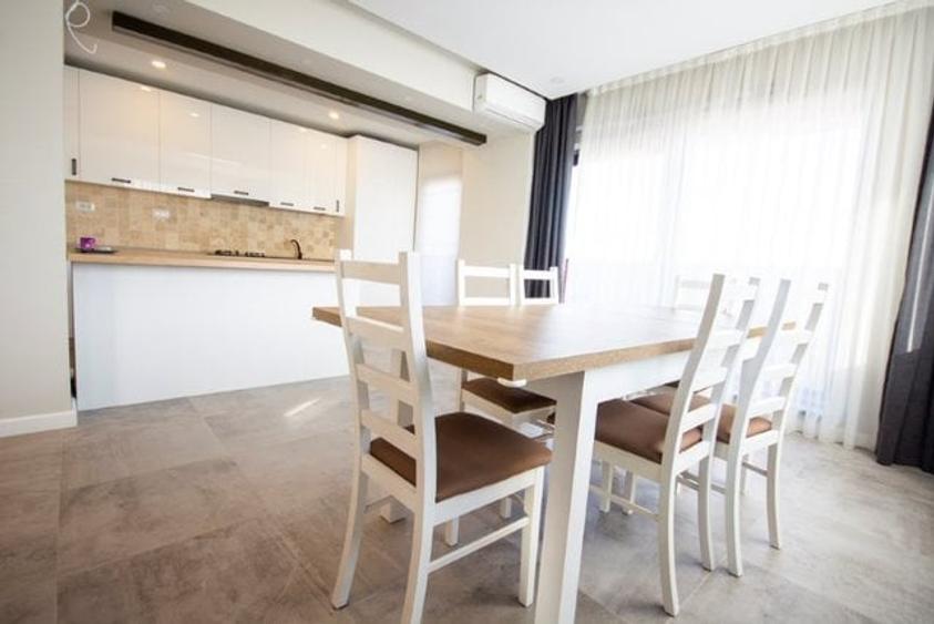 4 camere decomandat, mobilat , utilat ,terasa 24 mp,incalzire in pardosela - 9