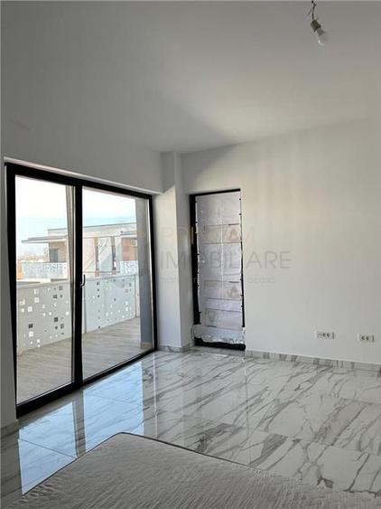 GIROC - 2 CAM - SPATIOS - PARCARE SUBTERANA - TERASA MARE - 7