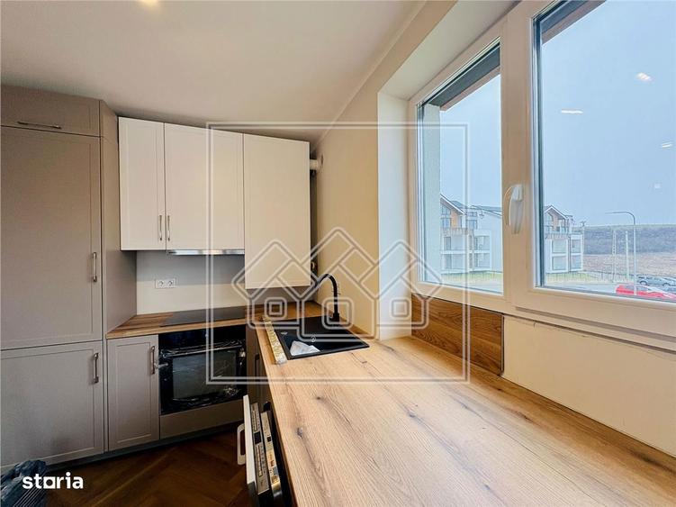 Ap. 3 camere, 2 bai si terasa 15,44 mp - decomandat - prima inchiriere - 8