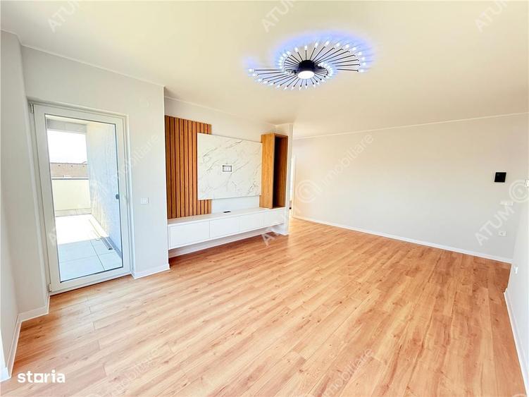 Penthouse cu 3 camere terasa 40 mp 85 mp utili si 2 locuri parcare - 2