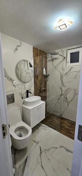 inchiriez apartament cu doua cam renovat recent - 1