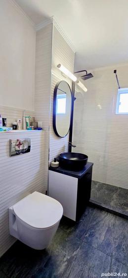 Apartament spatios cu 3 camere,pozitie excelenta in Ramnicu Valcea - confort si lumina - 9