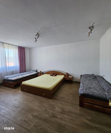 Casă cu 4 camere decomandat în Sânmartin