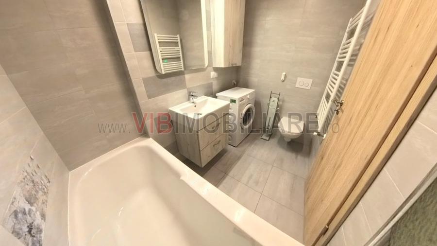 Apartament cu 2 camere semidecomandat, mobilat în Tractorul