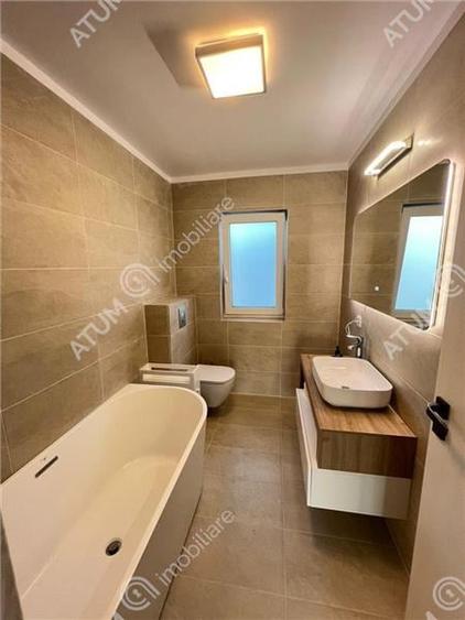 Casa individuala cu 5 camere si curte libera de 430 mp in Cisnadie - 16