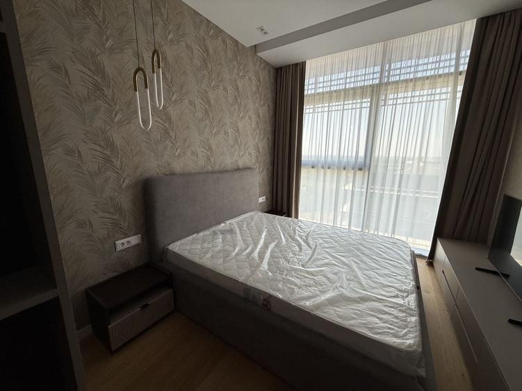 Apartament cu 3 camere semidecomandat, mobilat în Nord