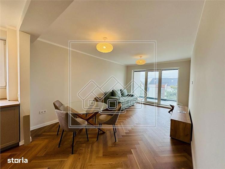 Ap. 3 camere, 2 bai si terasa 15,44 mp - decomandat - prima inchiriere - 10
