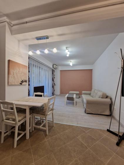 ASE -  Romana - Dorobanti - nou - 2 camere - mobilat modern - centrala termica - 14